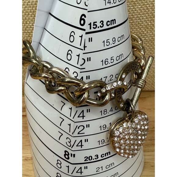 Guess Gold-Tone Chain-Link Toggle Bracelet With Pave Crystal Heart Charm - Picture 3 of 13